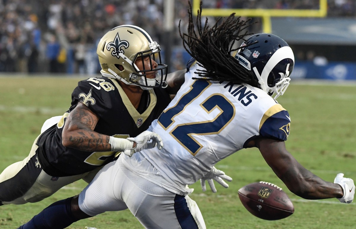 New Orleans cornerback P.J. Williams (26) breaks up a pass in the end zone to Rams receiver Sammy Watkins (12). Mandatory Credit: Robert Hanashiro-USA TODAY Sports